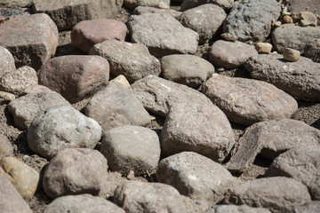 Pile of stones view. Preparing to fill the Foundation for the construction of a residential building or laying a garden path.