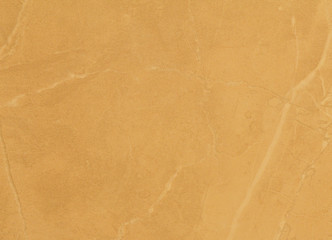 Brown-yellow patterns of porcelain tile or marble.