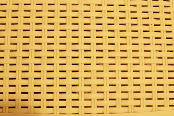 Yellow plastic grille or crate.