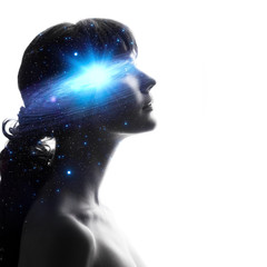 Profile of a woman with the galaxy as a brain. The scientific concept.