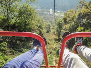  View from the height of the cable car to the beautiful green valley in Lagonaki