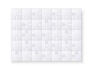 Set of jigsaw puzzle templates. Many puzzle pieces isolated on a white background. Vector illustration
