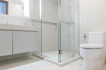 white toilet clean and simple bathroom