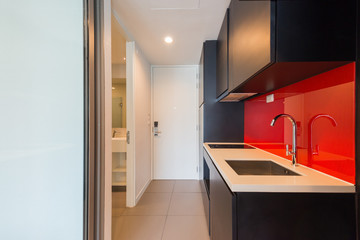 Modern kitchen interior with electric and microwave oven