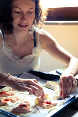 Young woman cooking at home