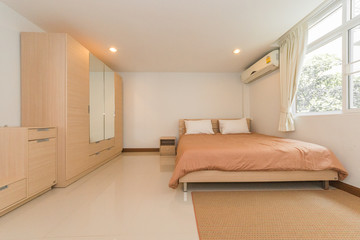 Bright Interior of cozy bedroom in modern design