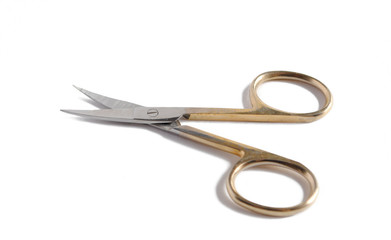 small old nail scissors on a white background