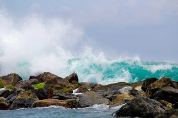waves crashing on rocks