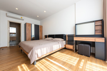 Bright Interior of cozy bedroom in modern design