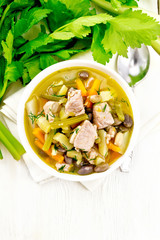 Soup Eintopf in bowl on board top