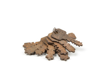 Bunch of  retro rusty keys for padlock on a white