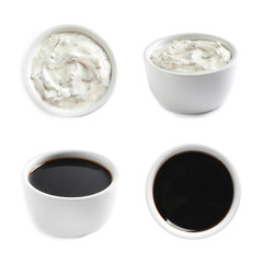 Set of different delicious sauces on white background