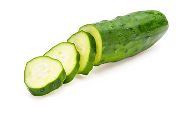 Cucumber, chopped, raw and fresh with drops of water. Isolated on white background.