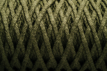 The texture of the rope green in a skein. Abstract background.