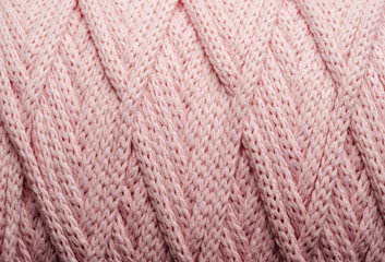 The texture of the rope pink in a skein. Abstract background.