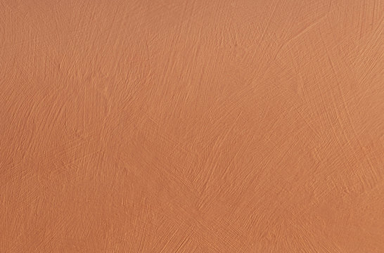 Clean moca mousse creamy textured surface, wooden board painted with chalk paint, brush strokes