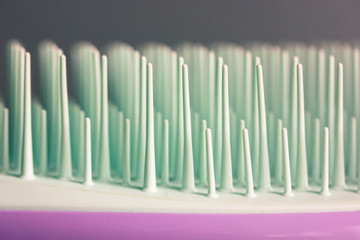 Close-up plastic hairbrush teeth