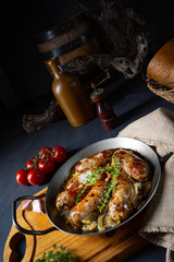 Homemade white sausage fried with onion and herbs