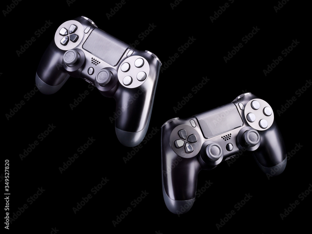 Canvas Prints Set of black video game joysticks gamepad isolated on a black background