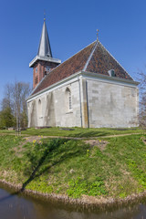 Fototapeta na wymiar Historic church of Saaxumhuizen village in Groningen, Netherlands