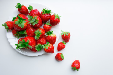 strawberries on a white plate