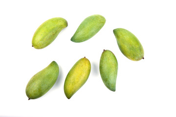 Fresh green mango on white background. Top view of keaw sawaei mango. High angle view of mangoes. Tropical fruit.