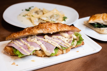 Ham croissant sandwich