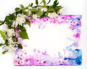 White fruit apple blossom flower and hand painted watercolor blot spot on white background. A4 paper size border frame photo with free blank copy space for text. For card, invitation or wedding decor