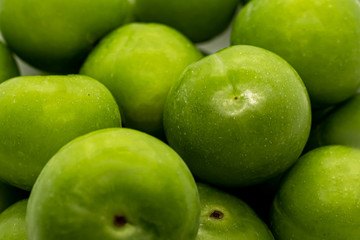 close up green fresh plums or greengage,fruit wallpaper. 