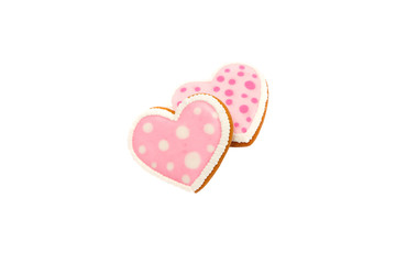 background from pink cookies heart shaped with different patterns, isolated on the white