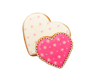 background from pink cookies heart shaped with different patterns, isolated