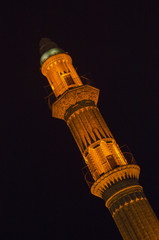 Sehidiye Mosque and its minaret with old Mardin cityscape Mardin, Turkey.
