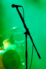 Close-up Of Microphone Against Green Background