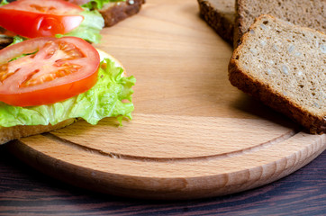 sandwiches with vegetables, cheese and meat close-up