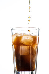 cocktail with ice and cola in a glass on a white background, you can add rum or whiskey