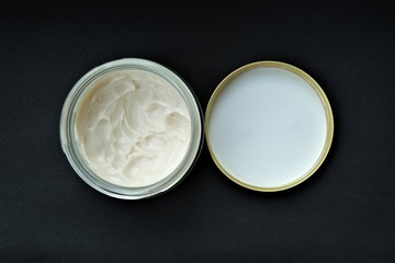 jar with cosmetic cream and lid
