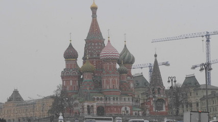 Fototapeta premium MOSCOW - OCTOBER 14: Moscow Red square. St Basils cathedral and Spasskaya tower on October 14, 2018 in Moscow, Russia