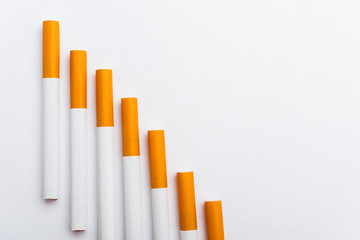 31 May of World No Tobacco Day, Close up step staircase pile cigarette or tobacco on white...
