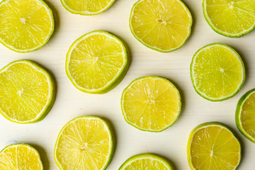 Fototapeta premium Lime slices on a wooden surface