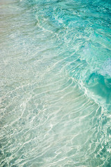close up of tropical aquamarine rippled sea - clear blue water