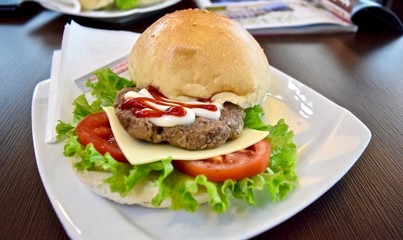 The hamburger at the airport restaurant.