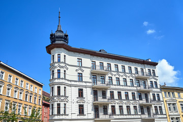 Fototapeta premium Facades of reconstructed historic tenement houses on a sunny day in the city of Poznan..