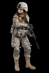 Male in US Army soldier uniform praying. Shot in studio. Isolated on black background