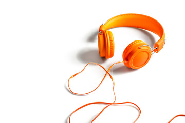 Nice orange studio headphone on white background.