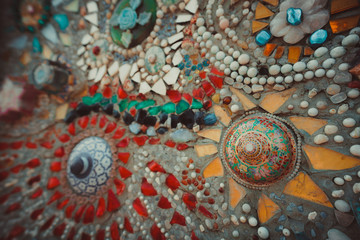 Fototapeta na wymiar Art mosaic glass on the wall in Buddhist Thailand Temple in Asia, Asia art, culture and Religion. mosaic background. colorful mosaic. texture mosaic.