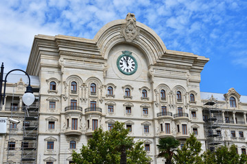  Fragment of beautiful historical building with a clock on Fuzuli street. Azerbaijan, Baku city