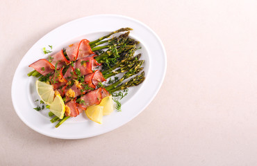Baked asparagus wrapped in ham