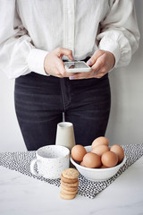 Woman making photo of food © 4Media Creations