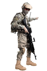 Male in US Army uniform soldier (Flag of the USA on the shoulder). Shot in studio. Isolated with clipping path on white background