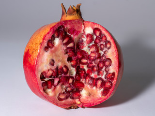 pomegranate on a grey background